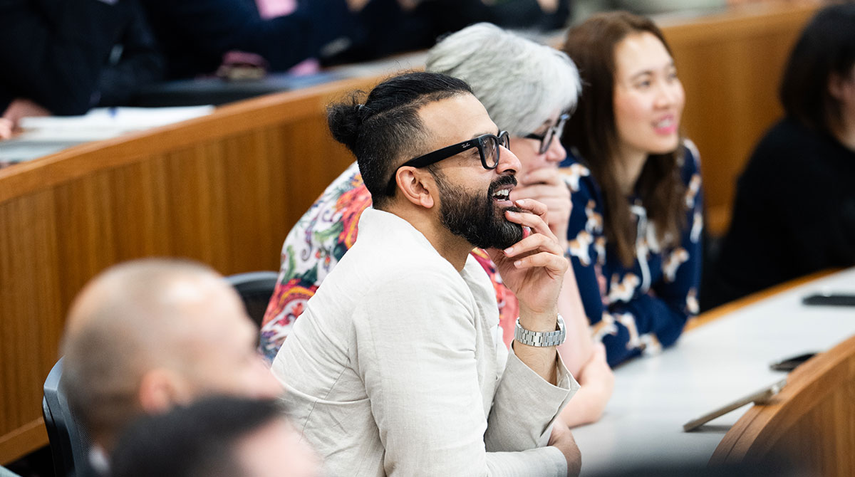 Scholarship Opportunities | Students having a discussion | Melbourne Business School