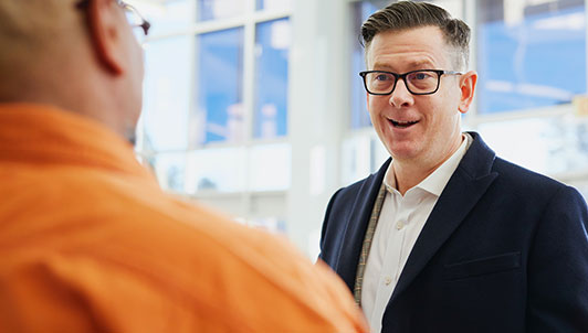 two men having a discussion
