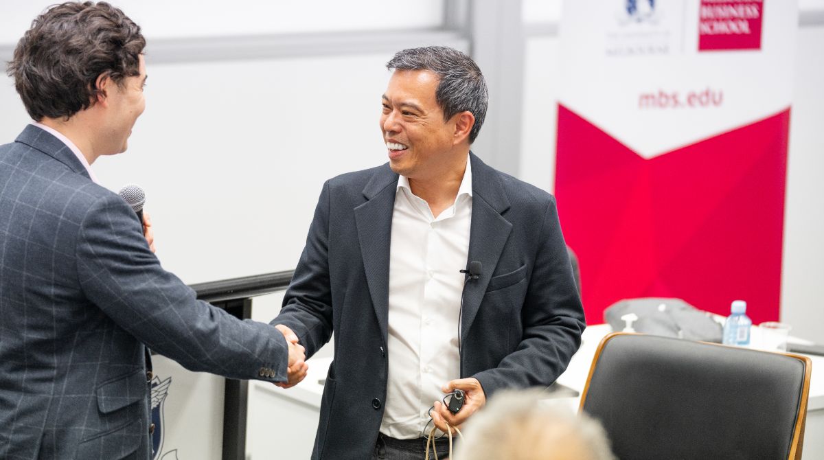 Gavi-Director-Derrick-Sim-greeting-Melbourne-Business-School-student